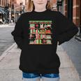 Christmas Cat Santa Bookshelves Book Lover Reader Youth Crewneck Sweatshirt