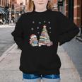 Christmas A Penguin Reading Book Snowflake Cocoa Hot Teacher Youth Crewneck Sweatshirt Christmas A Penguin Reading Book Snowflake Cocoa Hot Teacher Youth Crewneck Sweatshirt