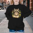 Cute Raccoon Reading Book Flowers Floral Youth Crewneck Sweatshirt Cute Raccoon Reading Book Flowers Floral Youth Crewneck Sweatshirt