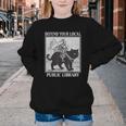 Defend Your Local Library Knight Cat Rider Book Lover Youth Crewneck Sweatshirt Defend Your Local Library Knight Cat Rider Book Lover Youth Crewneck Sweatshirt