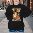 Floral Cow Reading Pun Just One More Chapter Cozy Book Lover Youth Crewneck Sweatshirt Floral Cow Reading Pun Just One More Chapter Cozy Book Lover Youth Crewneck Sweatshirt