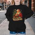 He Sees What You’Ve Been Reading Santa Book Lover Christmas Youth Crewneck Sweatshirt He Sees What You’Ve Been Reading Santa Book Lover Christmas Youth Crewneck Sweatshirt