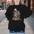 Skeleton Reading Book Halloween Bookworm Bibliophile Reader Youth Crewneck Sweatshirt