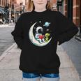 UFO Alien Astronaut Reading Book In Space Youth Crewneck Sweatshirt