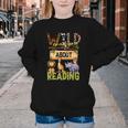 Wild About Reading Reading Books And Bookworm Library Day Youth Crewneck Sweatshirt