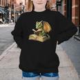 Women's Dragon Bookworm Reading Book Graphic Youth Crewneck Sweatshirt Women's Dragon Bookworm Reading Book Graphic Youth Crewneck Sweatshirt
