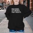 Women's Read Books Lift Weights Fight Fascists Reading Activism Youth Crewneck Sweatshirt Women's Read Books Lift Weights Fight Fascists Reading Activism Youth Crewneck Sweatshirt