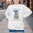 A Book A Day Keeps Reality Away Premium Tri-Blend Youth Crewneck Sweatshirt A Book A Day Keeps Reality Away Premium Tri-Blend Youth Crewneck Sweatshirt
