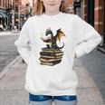 Book Dragon Youth Crewneck Sweatshirt Book Dragon Youth Crewneck Sweatshirt