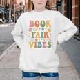 Book Fair Vibes Groovy Retro School Reading Nostalgic Youth Crewneck Sweatshirt Book Fair Vibes Groovy Retro School Reading Nostalgic Youth Crewneck Sweatshirt