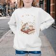 Coffee Cats & Books Cute Cat Book Lover Reading Youth Crewneck Sweatshirt Coffee Cats & Books Cute Cat Book Lover Reading Youth Crewneck Sweatshirt