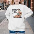 Defying Censorship One Page At a Time Read Banned Books Youth Crewneck Sweatshirt