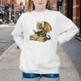 Dragon Bookworm Reading Book Graphic Youth Crewneck Sweatshirt Dragon Bookworm Reading Book Graphic Youth Crewneck Sweatshirt