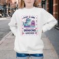Just A Girl Who Loves Dragons And Books Lover Reading Book Youth Crewneck Sweatshirt Just A Girl Who Loves Dragons And Books Lover Reading Book Youth Crewneck Sweatshirt