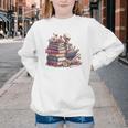 Reading A Book Per Day Keeps Reality Away Skeleton Books Youth Crewneck Sweatshirt