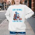 Reading Is Snow Much Fun Christmas Xmas Book Reading Youth Crewneck Sweatshirt Reading Is Snow Much Fun Christmas Xmas Book Reading Youth Crewneck Sweatshirt