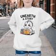 Unearth a Story Cute Dinosaur Summer Reading 2026 Dino Book Youth Crewneck Sweatshirt Unearth a Story Cute Dinosaur Summer Reading 2026 Dino Book Youth Crewneck Sweatshirt