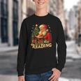 He Sees What You’Ve Been Reading Santa Book Lover Christmas Youth Crewneck Sweatshirt He Sees What You’Ve Been Reading Santa Book Lover Christmas Youth Crewneck Sweatshirt