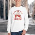 He Sees What You'Ve Been Reading Santa Book Youth Crewneck Sweatshirt He Sees What You'Ve Been Reading Santa Book Youth Crewneck Sweatshirt