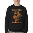 Education Is Freedom Teacher Book Black History Month Youth Crewneck Sweatshirt