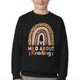 Leopard Teacher Wild About Reading Books Reader Librarian Youth Crewneck Sweatshirt Leopard Teacher Wild About Reading Books Reader Librarian Youth Crewneck Sweatshirt