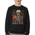 Read In Peace Skeleton Reading Book Halloween Teacher Youth Crewneck Sweatshirt