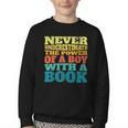 Retro Never Underestimate The Power Of a Boy With a Book Youth Crewneck Sweatshirt