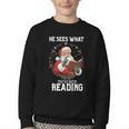 He Sees What You'Ve Been Reading Santa Book Lover Youth Crewneck Sweatshirt He Sees What You'Ve Been Reading Santa Book Lover Youth Crewneck Sweatshirt
