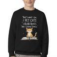 That's What I Do I Pet Cats I Read Books And I Know Things Youth Crewneck Sweatshirt