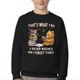That's What I Do I Read Books And Forget Things Love Books Youth Crewneck Sweatshirt That's What I Do I Read Books And Forget Things Love Books Youth Crewneck Sweatshirt