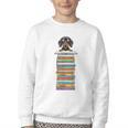 Cute Wiener Dog Dachshund Reading On Pile Of Books Youth Crewneck Sweatshirt Cute Wiener Dog Dachshund Reading On Pile Of Books Youth Crewneck Sweatshirt