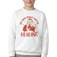 He Sees What You'Ve Been Reading Santa Book Youth Crewneck Sweatshirt He Sees What You'Ve Been Reading Santa Book Youth Crewneck Sweatshirt