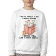 That's What I Do I Read Books I Drink Tea And I Know Things Youth Crewneck Sweatshirt That's What I Do I Read Books I Drink Tea And I Know Things Youth Crewneck Sweatshirt