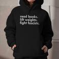 Women's Read Books Lift Weights Fight Fascists Reading Activism Meme Graphic Youth Hoodie Women's Read Books Lift Weights Fight Fascists Reading Activism Meme Graphic Youth Hoodie