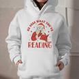He Sees What You'Ve Been Reading Santa Book Graphic Youth Hoodie He Sees What You'Ve Been Reading Santa Book Graphic Youth Hoodie