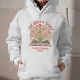 Unearth a Story 2026 Summer Reading Program Flowers Book Premium Tri-Blend Graphic Youth Hoodie Unearth a Story 2026 Summer Reading Program Flowers Book Premium Tri-Blend Graphic Youth Hoodie