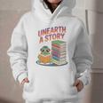 Unearth A Story Cute Turtle Reading Books Librarian Graphic Youth Hoodie