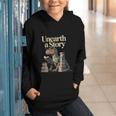 Women's Unearth A Story Dinosaur Reading a Library Book Graphic Youth Hoodie