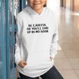 Be Careful Or You’Ll End Up In My Book Graphic Youth Hoodie