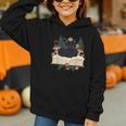 Cat On Open Book Mushrooms Ferns Dark Academia Graphic Youth Hoodie Cat On Open Book Mushrooms Ferns Dark Academia Graphic Youth Hoodie