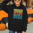 Retro Never Underestimate The Power Of a Boy With a Book Graphic Youth Hoodie Retro Never Underestimate The Power Of a Boy With a Book Graphic Youth Hoodie