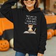 That's What I Do I Pet Cats I Read Books And I Know Things Graphic Youth Hoodie That's What I Do I Pet Cats I Read Books And I Know Things Graphic Youth Hoodie