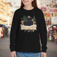 Cat On Open Book Mushrooms Ferns Dark Academia Youth Long Sleeve Tee Cat On Open Book Mushrooms Ferns Dark Academia Youth Long Sleeve Tee