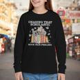 Chasing That Scholastic Book Fair Feeling Apparel Youth Long Sleeve Tee