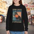 Drink Coffee Read Books Dismantle Systems Of Oppression Cat Youth Long Sleeve Tee Drink Coffee Read Books Dismantle Systems Of Oppression Cat Youth Long Sleeve Tee