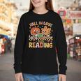 Fall In Love With Reading Autumn Pumpkin Teacher Book Lover Youth Long Sleeve Tee Fall In Love With Reading Autumn Pumpkin Teacher Book Lover Youth Long Sleeve Tee
