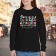 Groovy Christmas Most Likely To Read A Book On Christmas Youth Long Sleeve Tee