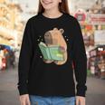 Pet Capybara Is Reading Library Capy Word Book Day Teacher Men Women Kids Youth Long Sleeve Tee Pet Capybara Is Reading Library Capy Word Book Day Teacher Men Women Kids Youth Long Sleeve Tee