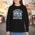 I Read Past My Bedtime Reading Dolphin Book Lover Youth Long Sleeve Tee