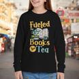 Reading Hobby Bookshelves Library Fueled By Books And Tea Youth Long Sleeve Tee Reading Hobby Bookshelves Library Fueled By Books And Tea Youth Long Sleeve Tee